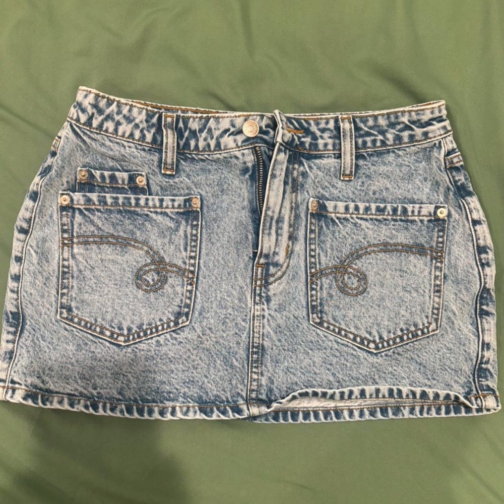 light blue mini skirt 
super cute will fit a size 26/27